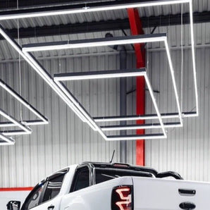Rectangle trio LED grid light for garages and showrooms