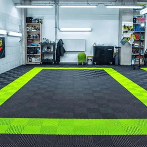 Interlocking garage floor tiles included in the package